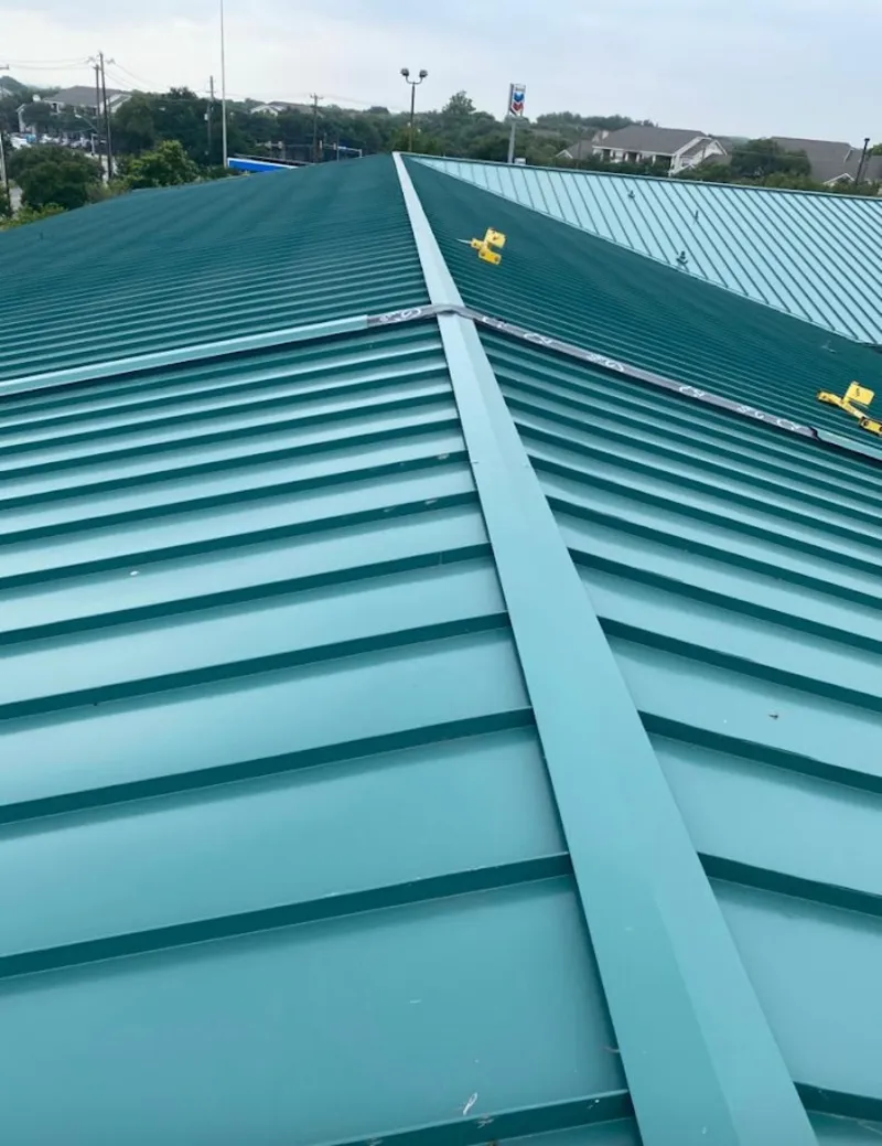 Green commercial metal roof ridge and valley for Metal Roof Repair in West Springfield Town