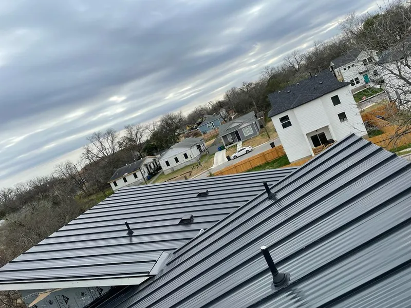 Standing seam metal roof panels with vents for Skylight Repair in West Springfield Town